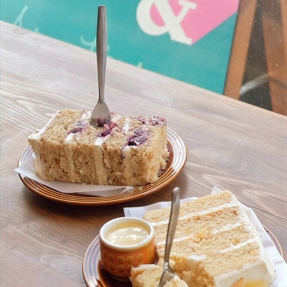 Bespoke vegan wedding cake with floral topper